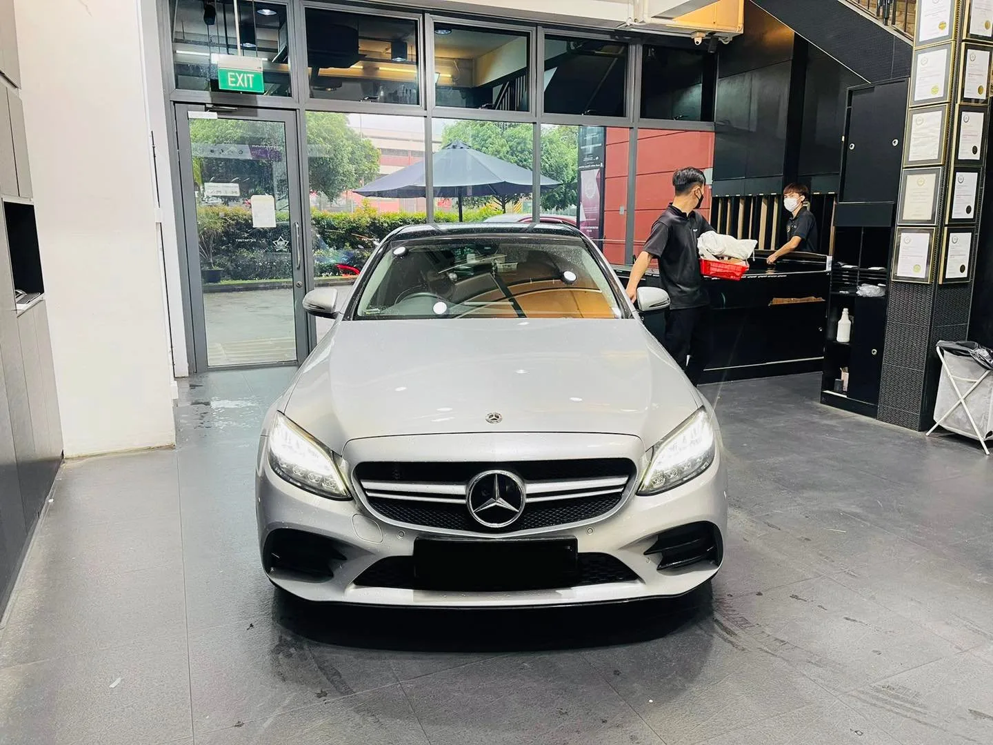 Silver Mercedes-Benz C-Class sedan front view at Infratint Singapore for window tinting