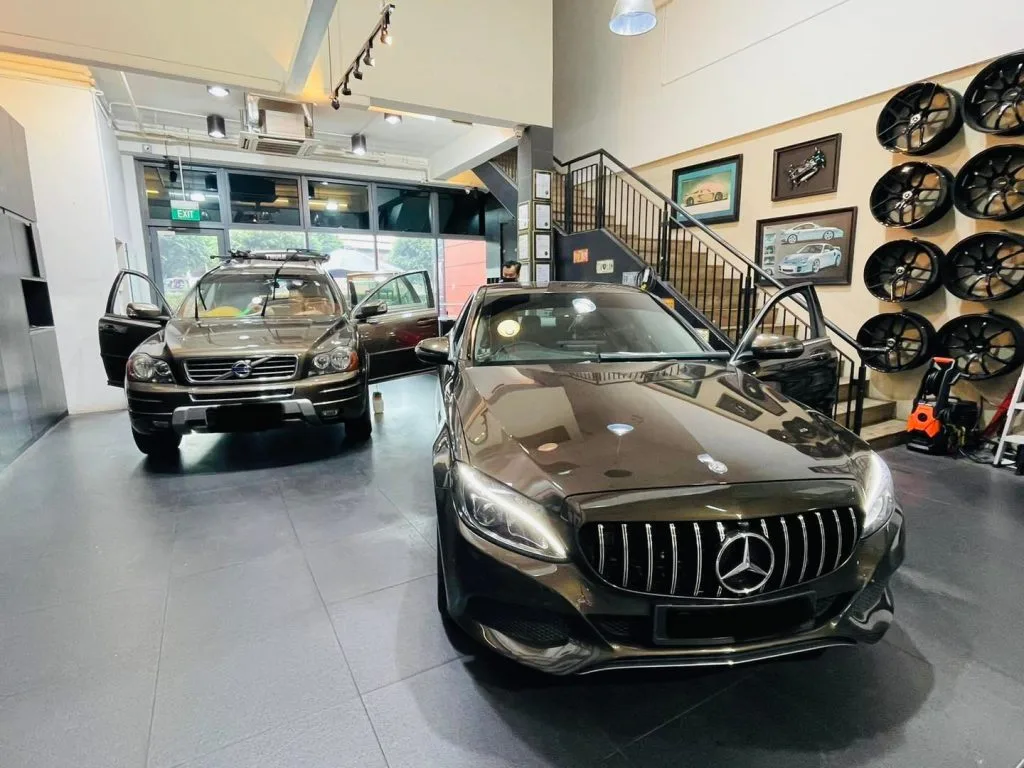 Bronze Volvo XC90 and grey Mercedes-Benz C-Class at Infratint Singapore for window film