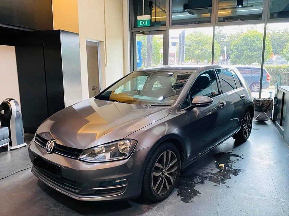 Grey Volkswagen Golf hatchback after window tinting at Infratint Singapore