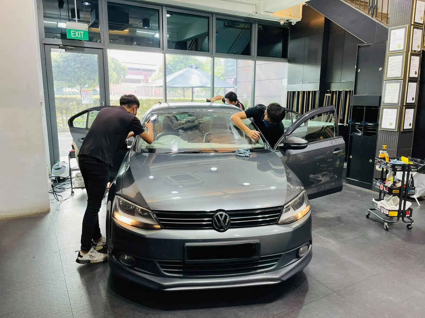 Grey VW Jetta having its windscreen tinted at Infratint Singapore