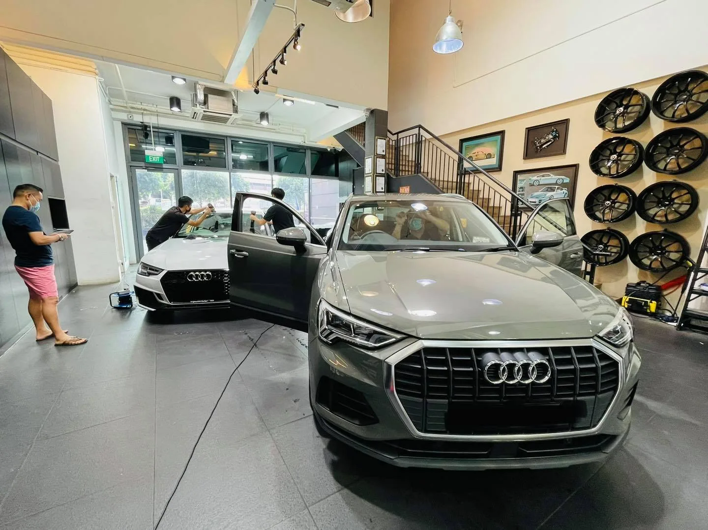 Grey Audi SUV during window tinting at Infratint Singapore