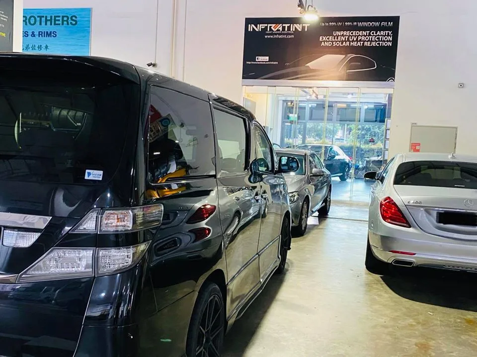 Black Toyota Vellfire and silver Mercedes-Benz S-Class at Infratint Singapore for window film