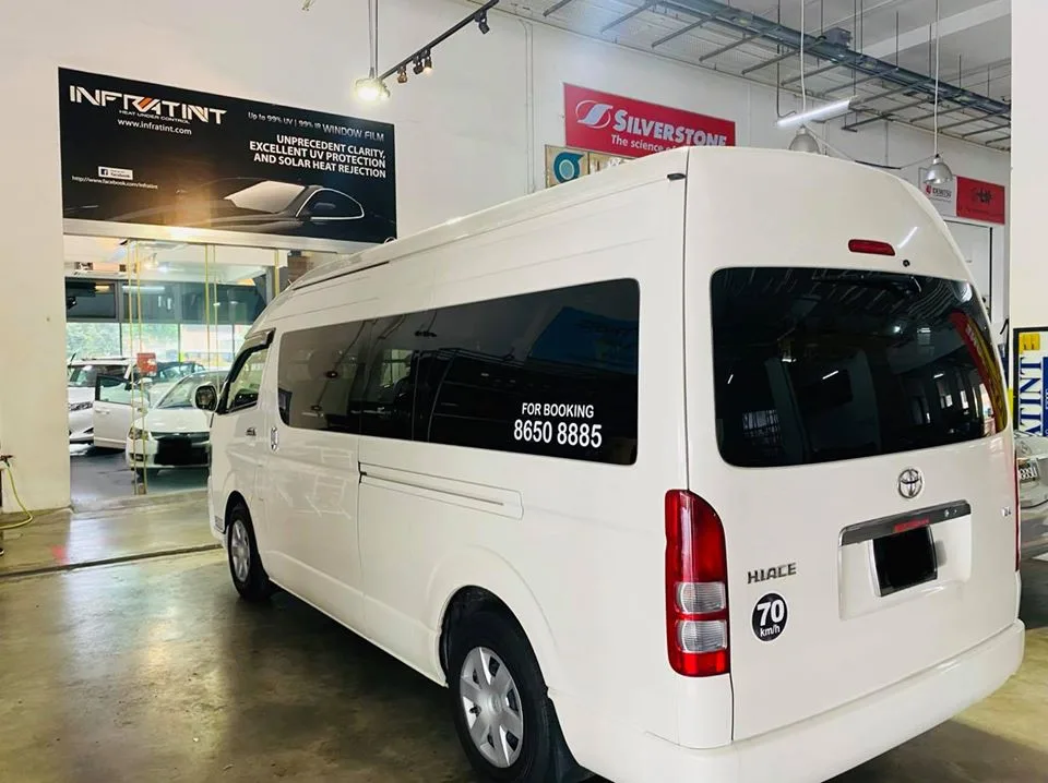 White Toyota Hiace van with tinted windows at Infratint Singapore