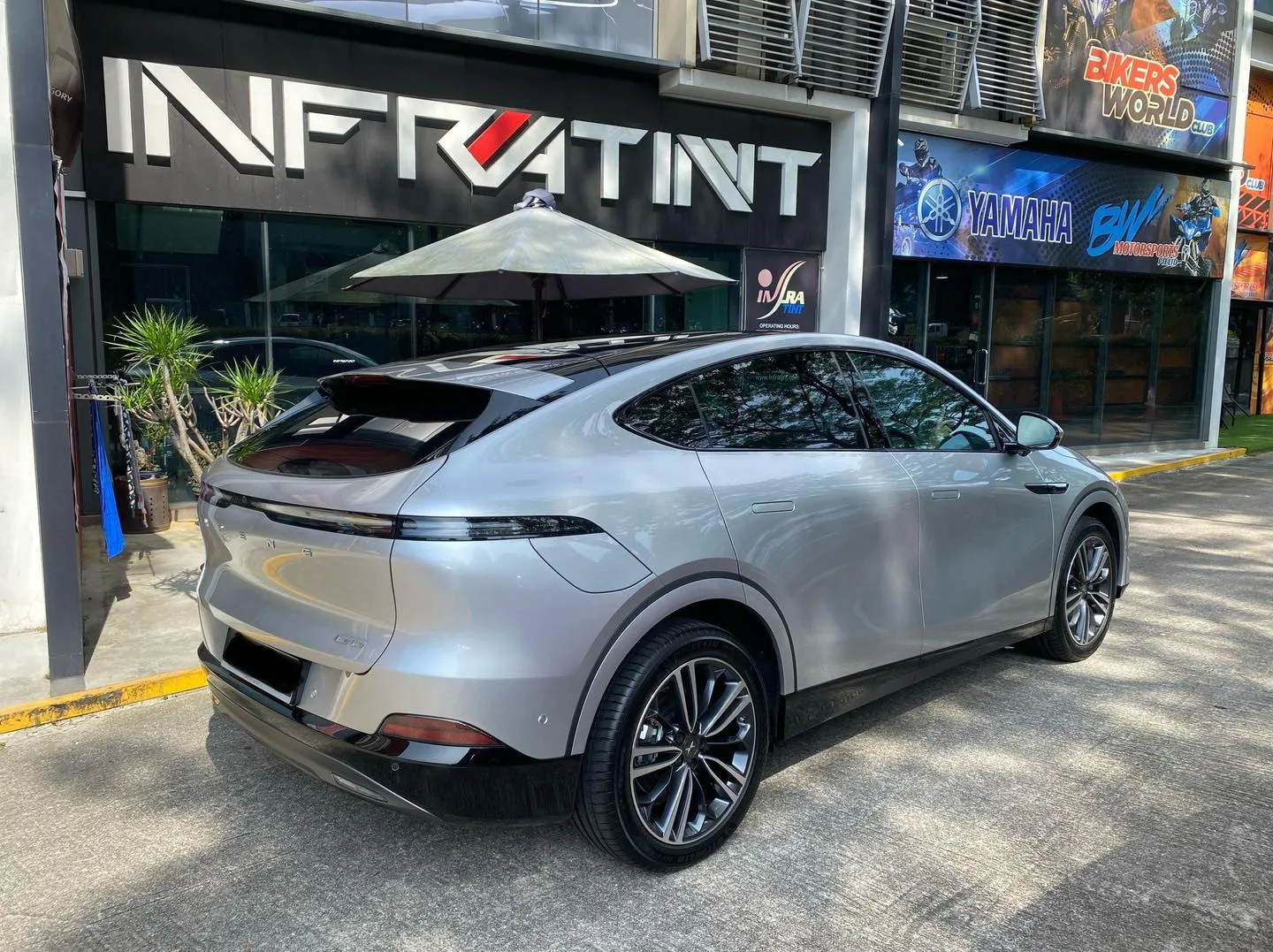 Silver XPENG G6 rear three-quarter view outside Infratint Singapore