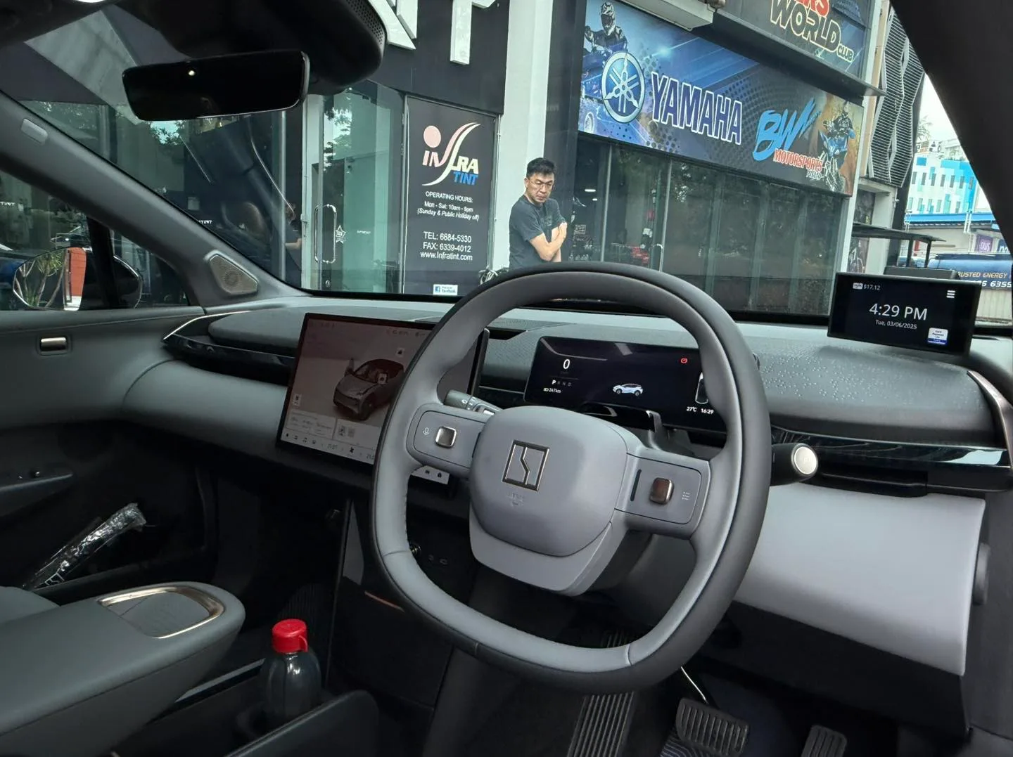 Zeekr X grey interior seen through tinted windscreen at Infratint Singapore